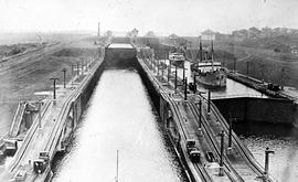 Shipping boat in lock