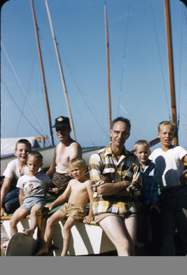 Yacht club members on boat